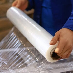 Stretch Film Rolls in Use - Manual Hand Stretch Wrap for Packing krytape