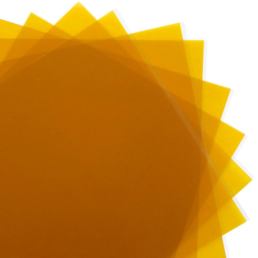 Amber polyimide film sheets stacked in a fan shape to show color transparency and thickness.