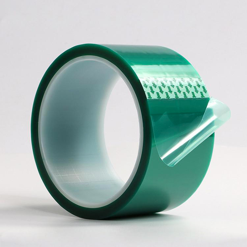 Green PET heat-resistant masking tape roll with easy-tear arrow tabs for industrial masking.