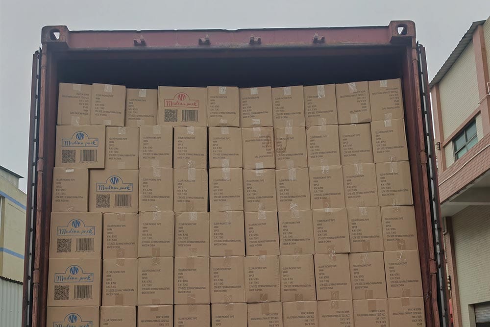 Export shipping container fully loaded with double sided tape cartons for international bulk delivery